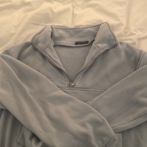 Brandy Melville light blue zip up sweatshirt. One size but it’s like a large.
